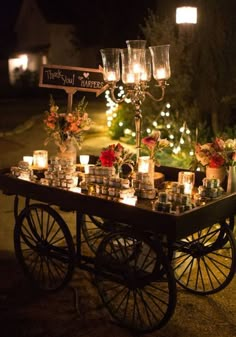 a table with candles and flowers on it