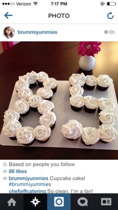 cupcakes are arranged in the shape of the letter e