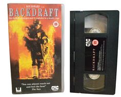 the backdraf vhs is next to an old dvd case with it's cover