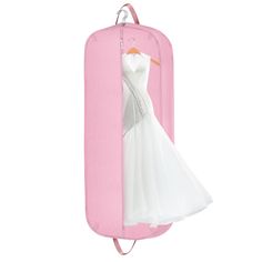 a white dress hanging on a pink garment rack