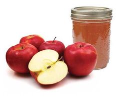 apples and honey sit next to each other