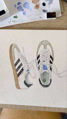 an image of two shoes painted on paper