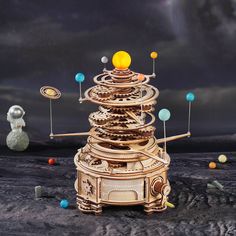 an image of a clock tower on the moon with planets in the sky behind it