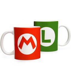 two coffee mugs with the letter l and m on them, both green and red