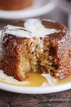 a piece of cake on a plate with icing