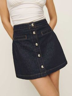 Wear the skirt. Shop the Amara High Rise Denim Mini Skirt from Reformation, a high-rise denim mini skirt with a button front and patch pockets. Denim Miniskirt, Stretch Denim Fabric, High Rise Denim, Denim Mini, Denim Mini Skirt, Denim Fabric, Recycled Cotton, A Line Skirts, Stretch Denim