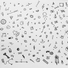 an image of various doodles drawn on paper