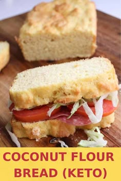 a close up of a sandwich on a cutting board with the words coconut flour bread keto