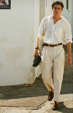 Stay Cool in Style: White Trousers Outfit Inspiration for Men! Beat the summer heat with these crisp white trousers paired with a light, breathable shirt. Whether you're strolling along the beach or enjoying a rooftop dinner, this outfit exudes effortless sophistication. Click the image to shop on Amazon and elevate your summer wardrobe! Grunge Outfits 90s, Japan Outfits, Greek Summer, 90s Fashion Men, Homecoming Outfits