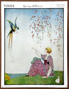 a woman sitting on the ground next to a bird