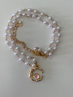 Pearl necklace with a moon-shaped pendant decorated with shiny stone and zircons. Length - 40 cm + extension 7 cm Coquette Necklace, Mha Dr, Necklace With Pearls, Streamer Dr, Pearl Choker Necklace, Gold Moon, Pearl Choker, Winter 2024, Charm Necklace