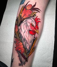 an image of a rooster with flowers on it's arm and the words, saved to nerd - traditional tattoos