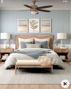 a bedroom with blue and white striped walls