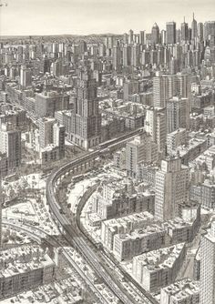 an aerial view of a city with lots of tall buildings and cars on the road