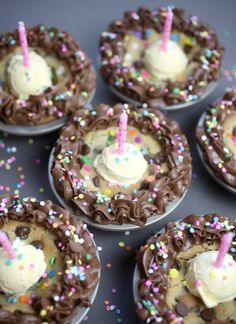 cupcakes with chocolate frosting, sprinkles and candles