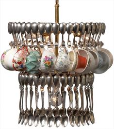 a chandelier with spoons and cups hanging from it