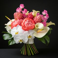 a bouquet of flowers on a black background