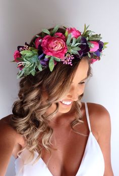 a woman wearing a flower crown on her head