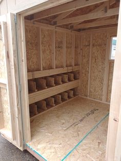 the inside of a storage shed is being built