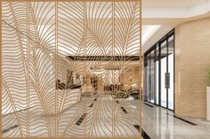 an artisticly designed room divider in the lobby