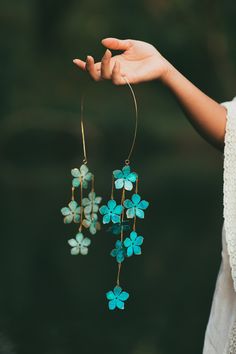 A dramatic cascade of verdant blossoms float from a hand hammered band for a stunning dose of bohemian glamour. All brass construction with natural verdigris patina. Nickel and lead free. Bohemian Green Jewelry With Flower Decoration, Bohemian Glamour, Metal Art Jewelry, Beach Jewelry Boho, 2024 Inspiration, Bold Statement Jewelry, Fairy Accessories, Abstract Jewelry, Silk Jewelry