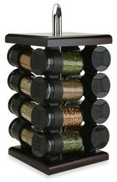 a spice rack with spices and seasonings on it