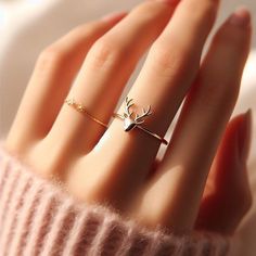 *Free engravings up to 20 characters* Embrace the majestic beauty of the forest with this enchanting minimalist deer antlers ring! 🌟 It's a graceful adornment for your finger or a splendid gift for anyone who finds solace in the wilderness and the grandeur of deer. 🦌🌲 Let's roam into versatility; this ring is perfect for stacking or making a statement on its own, crafting a subtle yet captivating allure. Meticulously designed, it features minimalist deer antlers along a delicate band, capturing the essence of these noble creatures. It's as stylish as it is evocative, ready to accompany you through woodland adventures or quiet moments in nature. Whether you're celebrating the serenity of the forest or simply in search of that unique piece of jewelry with a touch of the wild, this deer an Forest Rings, Korean Jewellery, Deer Ring, Simple Ring Design, Deer Antler Ring, Antler Ring, Korean Jewelry, Simple Ring, Deer Antlers