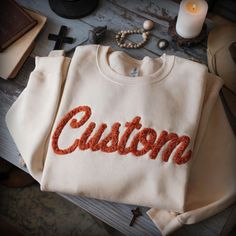 CUSTOM Embroidery Personalized YARN EMBROIDERED Sweatshirt, Chenille Yarn Team Game Day Gear Apparel Fuzzy Letters Customized Team Spirit Shirts IMPORTANT: If you are looking for a Tshirt (instead of a sweatshirt or hoodie) like this, follow this link to our other listing: https://sublimationblanksnet.etsy.com/listing/1779458399/custom-personalized-yarn-embroidered Personally Design, Digitized and Stitched out by Us. Yarn Color Options are available in the listings photos. If your color is not l Fuzzy Letter Sweatshirt, Custom Sweatshirt Ideas, Chenille Patch Sweatshirt, Embroidery Personalized, Letters Christmas, Team Spirit Shirts, Gifts For Tech Lovers, Social Worker Gifts, Sibling Gifts