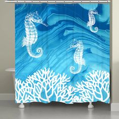 two seahorses are swimming in the ocean on blue water and corals shower curtain set