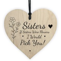 a wooden heart shaped plaque with the words friends if friends were flowers i would pick you