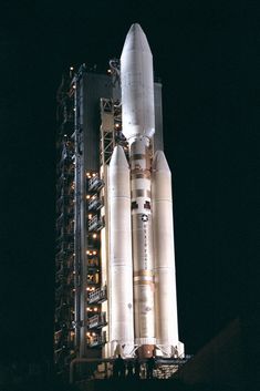 the space shuttle is on display at night