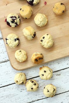 chocolate chip cookies are lined up on a baking sheet and ready to be baked in the oven