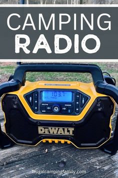 a radio sitting on top of a wooden table with the words camping radio above it