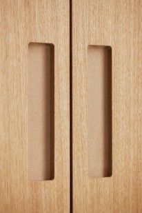 two wooden doors are shown with one open and the other partially closed in this image