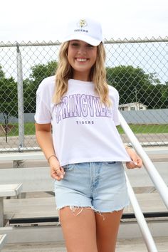 BEST SELLER! Gear up for gameday in our favorite mom crop tee! The soft wash and exclusive design make this tee an absolute must-have for cheering on your favorite team this season! Designed by Scarlet & Gold TTS; our model is wearing a small Slight crop; hits at the waist