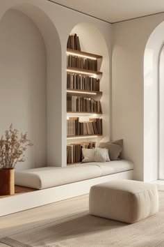 a living room filled with furniture and a book shelf