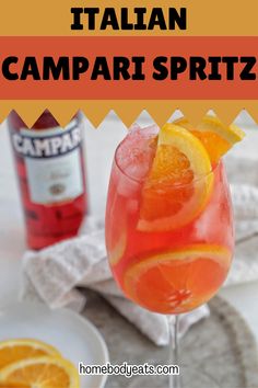 an orange and red drink with the words italian campari spritz