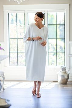 Indulge in luxury with the Comfy Kenzie Kaftan! This kaftan offers ultimate comfort and style. Perfect for all occasions, formal or informal, or even just lounging. With convenient pockets, it's perfect for going out or cozy nights in. Made from a soft wool blend that is 70% Merino wool and 30% acrylic. Click Here for Care Instructions Elegant Oversized V-neck Maxi Dress, Elegant V-neck Kaftan For Vacation, Elegant Relaxed Fit Dress For Loungewear, Elegant Summer Loungewear Maxi Dress, Oversized Chic Maxi Dress For Loungewear, Elegant Summer Maxi Dress For Loungewear, Spring Elegant Oversized Tunic, Chic Tunic Maxi Dress For Loungewear, Oversized Tunic Maxi Dress In Elegant Style