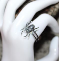 Elevate your Halloween look with our exquisite Spider Halloween Ring. Crafted with intricate detail and luxurious materials, this stunning piece is sure to add a touch of sophistication to any spooky ensemble. Metal :-  Silver Style : Insect Your order will be handmade and ready for shipment in 1 to 3 business days https://www.etsy.com/shop/RivikaDesigns Fantasy Rings For Halloween Gift, Silver Rings As Halloween Gift, Unique Metal Rings For Halloween, Silver Rings For Halloween Gift, Unique Silver Rings For Halloween, Handmade Magical Jewelry For Halloween, Elegant Rings As Halloween Gifts, Elegant Rings For Halloween Gifts, Elegant Halloween Gift Ring