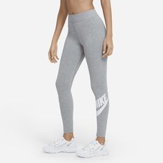 The perfect complement to your favorite tops and tees, the Nike Sportswear Leggings have a high-rise design and a stretchy waistband that sits above your navel. The soft, cotton blend wicks sweat, making these full-length leggings an easy choice for everyday wear. Grey Nike Leggings, Legging Adidas, Thermo Leggings, Sportswear Leggings, Graphic Leggings, Leggings Nike, Outfit Collage, Nike Leggings, Running Leggings