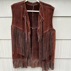 Incredible Unisex Vest Made Of Heavyweight Natural Suede With Gorgeous Fringe On Front & Back Sides. Probably Meant For Men/Women Size M-L But Can Fit A Wide Range Of Sizes Due To Open Front Style. Approx Length From Top Of Neck To Bottom Is About 28in Plus 5in Of Fringe At Bottom, Approx 22in Laying Flat Across Chest Measuring Under Pit. Awesome Vintage Westernwear Vibe! In Nearly New Condition. Suede Fringe Vest, Fringe Vest, Suede Fringe, Western Wear, Front Open, Jackets & Coats, Jackets For Women, Womens Sizes, The Incredibles