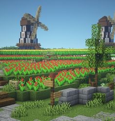 an image of a farm with flowers and windmills in the background