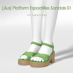 the legs and feet of a woman wearing green sandals