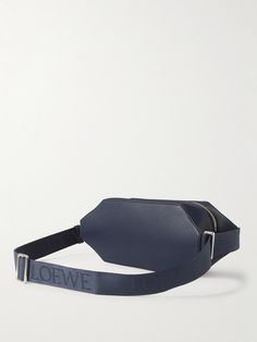 Loewe's belt bag elegantly showcases the sleek, architectural lines the house is known for. It's cut from supple leather in an elongated, hexagonal shape and has space enough for your essentials plus sunglasses and maybe a little bottle of aftershave, too. Wear it at the waist or sling it over the shoulder when you're on the move. Loewe Bracelet Bag, Loewe Pouch Bag, Loewe Anagram Belt, Loewe Men Bag, Black Loewe Puzzle Bag, Tom Ford Bag, Loewe Bag, Latest Bags, Leather Belt Bag