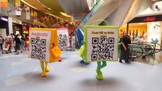 some people are walking through a mall with qr code signs on their back legs