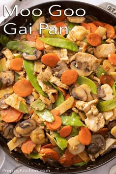 a skillet filled with vegetables and meat on top of a stovetop next to the words moo goo gai pan