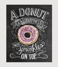 a chalkboard drawing of a donut with sprinkles on top that says, a donut is happiness