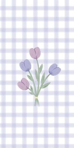 some purple flowers are on a white and blue checkered tablecloth with the words happy mother's day written in it