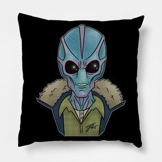 a pillow with an alien wearing a jacket on it's chest and black background