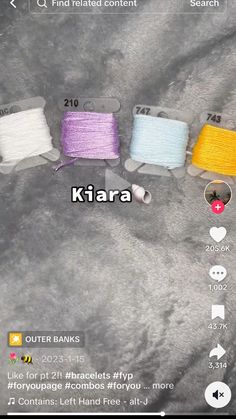 three spools of thread sitting next to each other